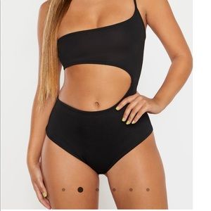 One shoulder cut out body suit